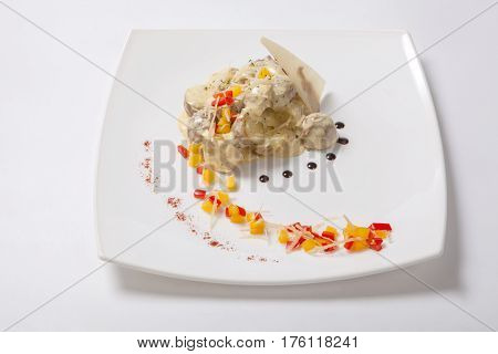 Baked In Their Skins Potatoes With A Creamy Sauce.