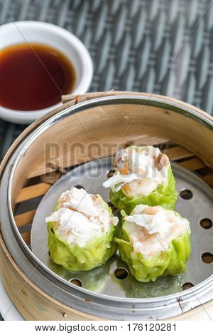 Chinese dim sum Shumai - Steamed Chinese groumet cuisine