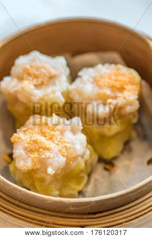 Chinese dim sum Shumai - Steamed Chinese groumet cuisine