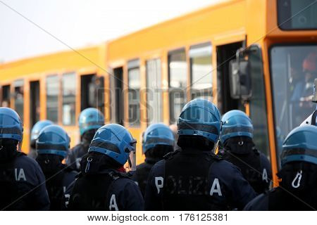 Riot Police While Escorting The Bus To The Stadium
