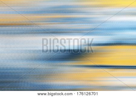 Blue yellow horizontal motion blur background photo