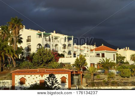 Callao Salvaje Tenerife Canary Islands Spain Europe - June 16 2016: Callao Salvaje modern apartments in Tenerife with storm clouds