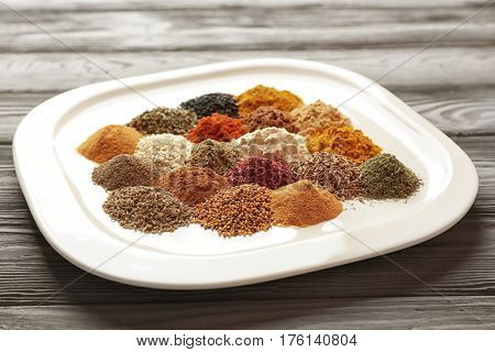 Different spices on white plate