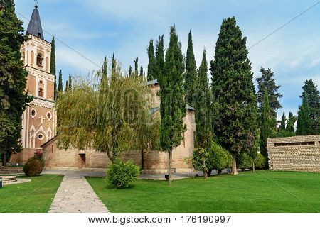 Bell Tower And St. George's Church In Monastery Of St. Nino At Bodbe. Sighnaghi. Georgia