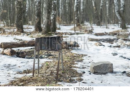 The brazier is in the forest. Place for barbecue