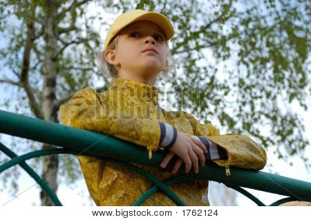 Young Girl In Yellow Clothes