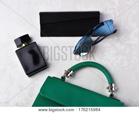 Small Womans Leather Green Bag With Sunglasses, Perfume And Case