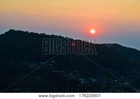 sunrise with lens flare over mountain,view from Doi Mon Tawan Chiang Mai Thailand