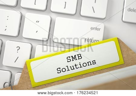 Yellow Index Card with Inscription SMB Solutions Lays on Modern Keyboard. Closeup View. Blurred Image. 3D Rendering.