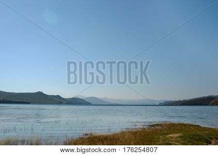 Baikal lake near Khuzhir villahe at Olkhon island in Siberia, Russia. Lake Baikal is the largest freshwater lake in the world.