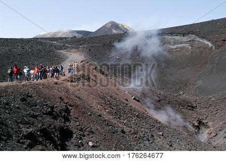 People Hiking At Mount Etna On The Island Of Sicily