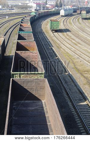industrial view with lot of freight railway trains waggons.