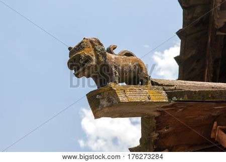 MANALI, INDIA.  Tripura Sundari Temple, the wooden statue of a lion on the roof. Naggar, district of Kullu in Himachal Pradesh, India.