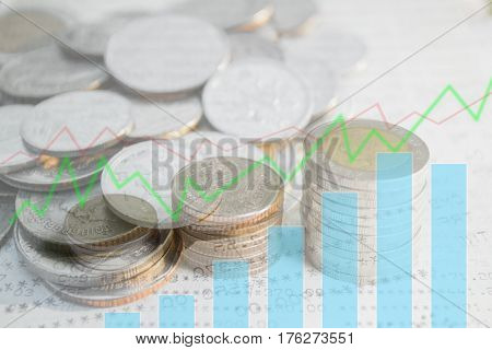 Double exposure of money coins stack with growing graph for finance and banking concept.