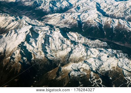 Aerial view of alps mountains covered with snow. Bird Eye View