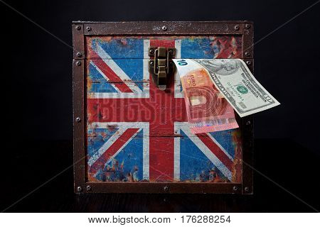 euro banknote and american dollar on British flag