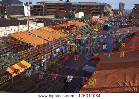 ORURO, BOLIVIA - FEBRUARY 24, 2017: Street in the mining city of Oruro that has been closed off to vehicles and lined with temporary seating in preparation for the annual Oruro Carnival.