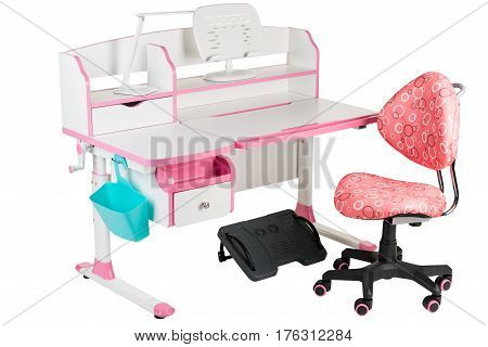 Pink chair pink school table blue basket desk lamp and black support under legs on the white isolated background.