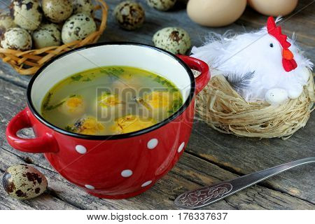 Traditional soup with egg yolk for Easter
