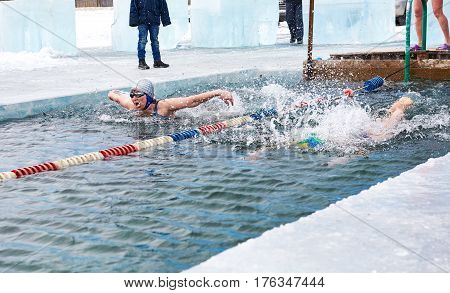 Sahyurta ,irkutsk Region, Russia - March 11.2017: Cup Of Baikal. Winter Swimming. Butterfly. Woman