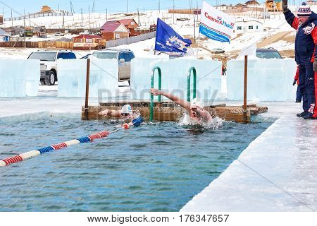 Sahyurta ,irkutsk Region, Russia - March 11.2017: Cup Of Baikal. Winter Swimming. Butterfly