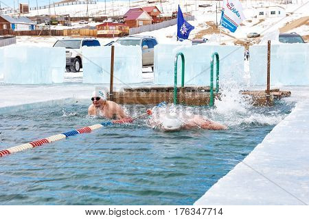 Sahyurta ,irkutsk Region, Russia - March 11.2017: Cup Of Baikal. Winter Swimming. Butterfly