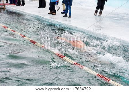 Sahyurta ,irkutsk Region, Russia - March 11.2017: Cup Of Baikal. Winter Swimming. Butterfly