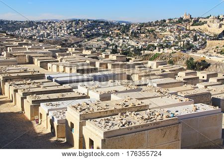 Dormition Abby in a panoramic view of Jerusalem from a cemetery on the Mount of Olives beside the Kidron Valley.