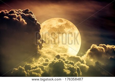 Nighttime Sky With Clouds And Bright Full Moon With Shiny.  Sepia Tone.