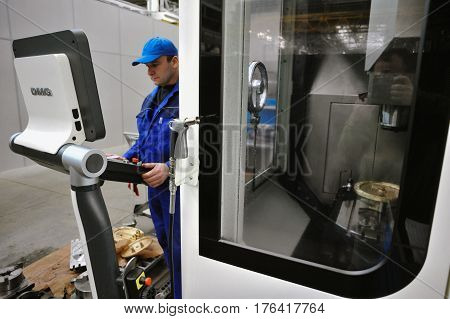 St. Petersburg Russia - February 13 2010: The Armalit factory produces ship armature for shipbuilding companies. Milling at work