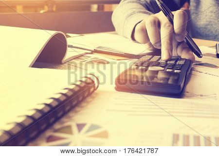 Calculator With Hand Woman Pressing Button And Thinking About Problem For Expense At Home Office.
