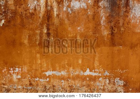 Dirty wall with broken cement plaster. Vintage surface texture. Rought painted wall background.