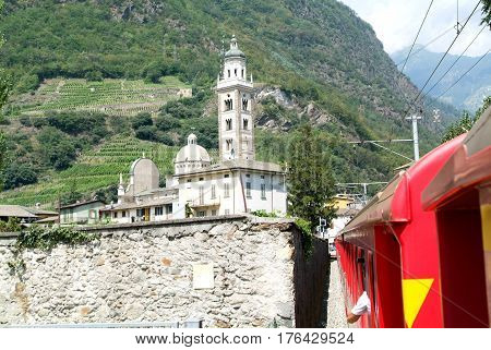 Bernina Express Train Arriving At Tirano On Italy
