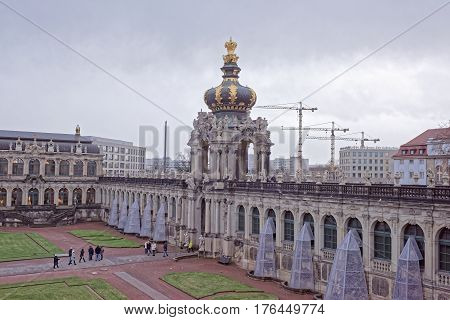 DresdenGermany-January 42017: Zwinger-palace and park complex of four buildings.The beginning was laid in 1709.Tourists visiting the sights