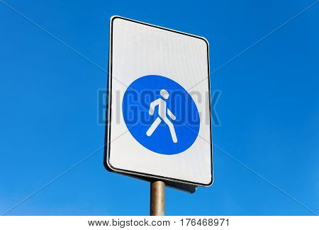 Pedestrian zone. Walkway road sign against blue sky