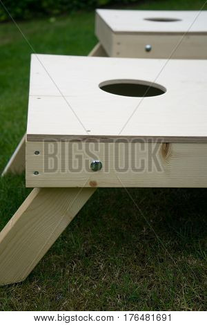 Close-Up of Cornhole Boards on Garden Grass