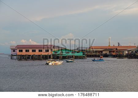 Labuan,Malaysia-March 15,2017:Evening scene of daily activities at Patau-Patau water village in Labuan,Malaysia.Patau-Patau water village is among famous place in Labuan Pearl Of Borneo,Malaysia.