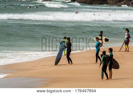 Guincho Portugal. 16 May 2014. Surfers on Guincho beach in late afternoon Guincho beach is in Cascais about 50 km of LisbonCascais 16 of May 2014. Lisbon Portugal. photography by Ricardo Rocha.