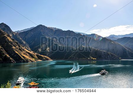 Beautiful Tianshan and Tianchi( heavenly Mountain and Lake) in Xinjiang, China.Tianchi Lake \'s elevation is 1980 meters, 3.5 kilometers long from north to south, the deepest place of the lake is 103 meters.