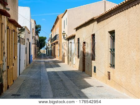 Tabarca Island, Spain - March 11, 2017: Charming narrow street in the Island of Tabarca. Province of Alicante. Spain