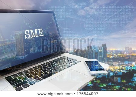 SMEs (SMALL AND MEDIUM-SIZED ENTERPRISES): Grey computer monitor screen. Digital Business and Technology Concept. Double Exposure Effects.
