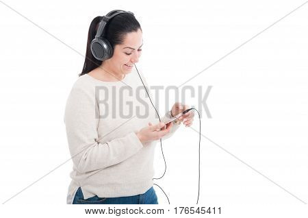 Young Woman Listening Music With Headphone