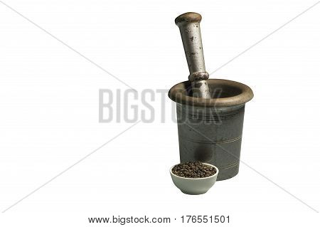 Isolated mortar with pestle and calyx with pepper.