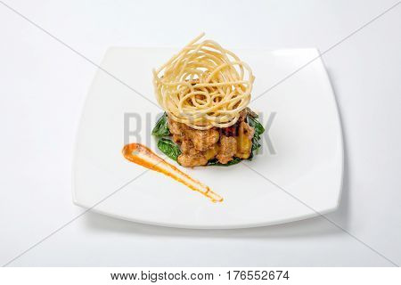 Fried Chicken In Sweet And Sour Sauce With French Fries.