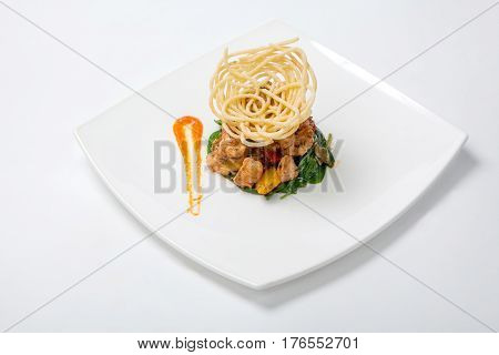 Fried Chicken In Sweet And Sour Sauce With French Fries.