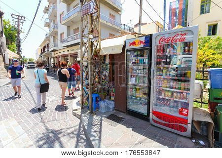 Rethymnon Island Crete Greece - June 23 2016: The small market stall with street refrigerators with various cold drinks on the street of part Old Town in Rethymnon for tourists and local citizens