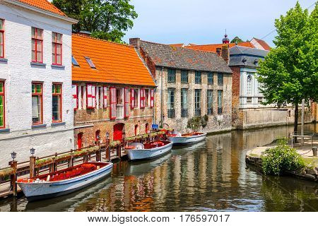 Historic medieval buildings with beautiful canal in the old town of Bruges (Brugge), Belgium