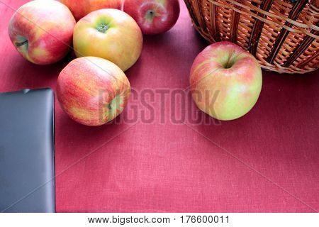 apple red on rose background basket agriculture garden harvest taste fresh collection heap disorder tablet black
