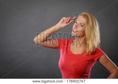 Happy Woman Pointing Up With Finger
