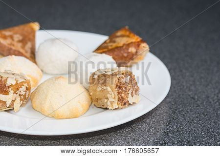 Delicious Assortment Of Homemade Asian Pastries. Samosas With A Rose Flower And Banana Balls